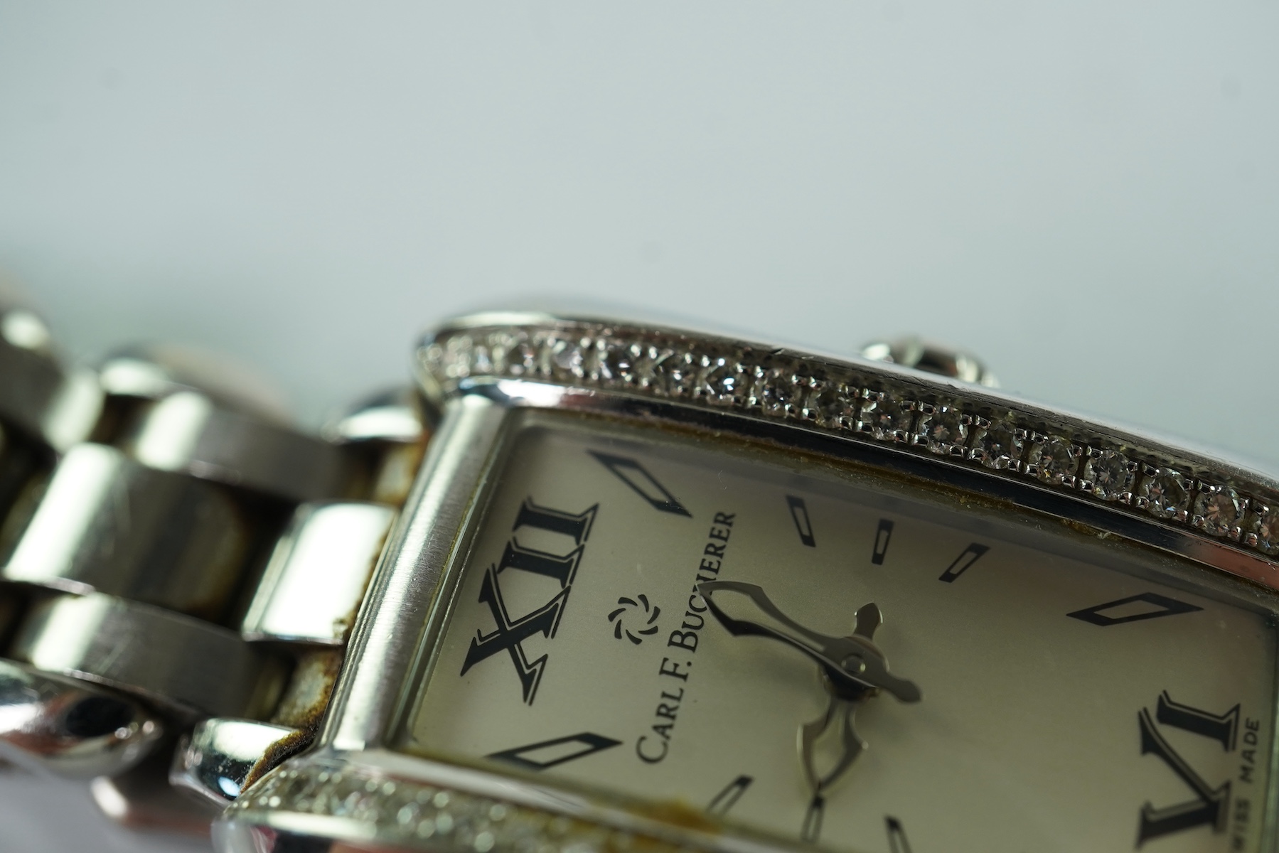 A lady's 2007 stainless steel and diamond set Carl F. Bucherer quartz wrist watch, on a stainless steel bracelet